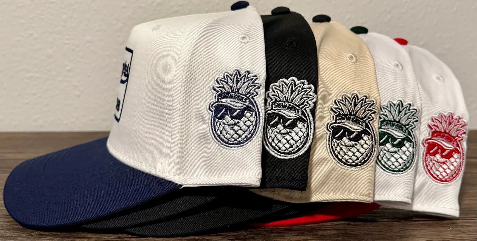 Golfer wearing Swingers Club hat on the fairway